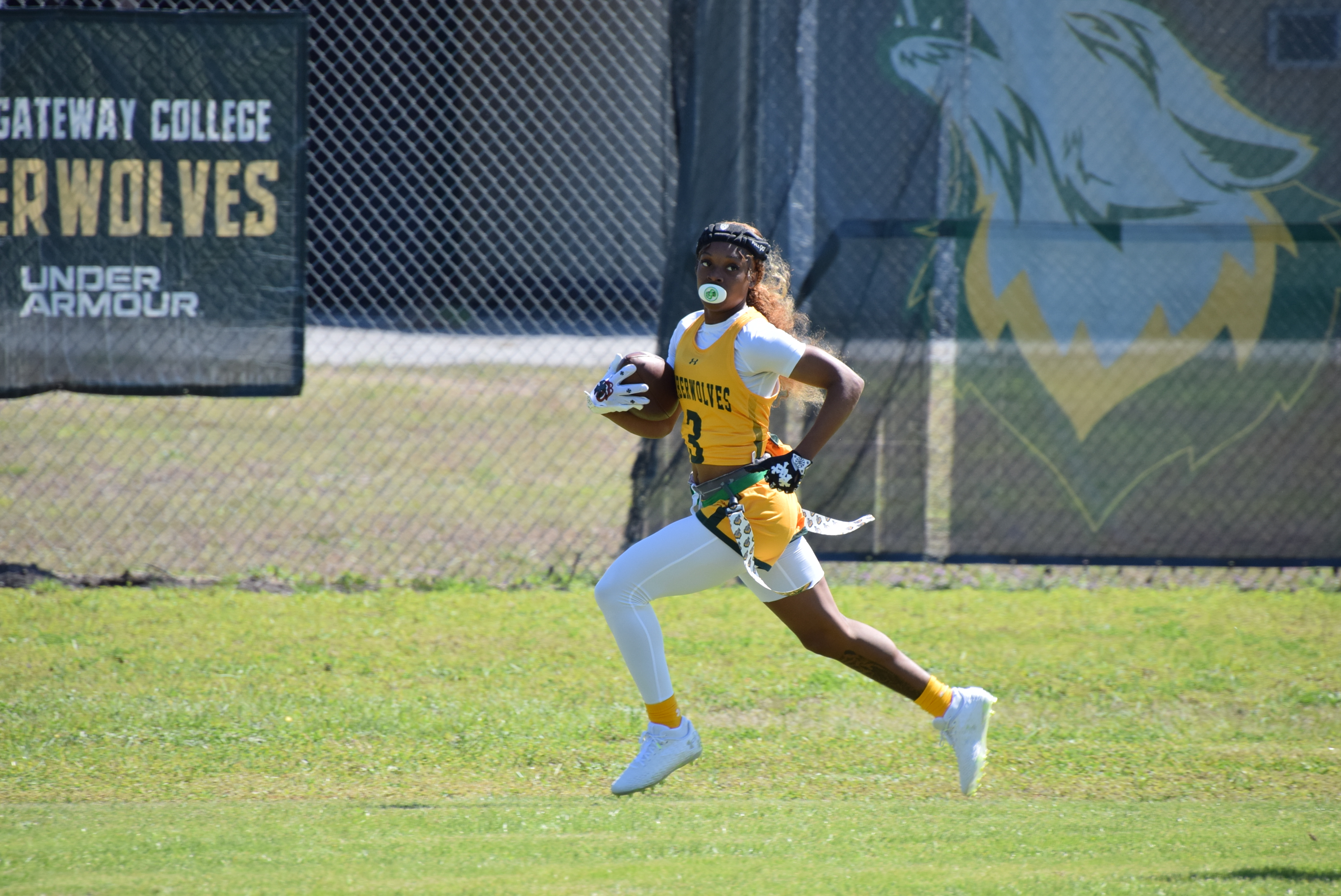 Flag football player running