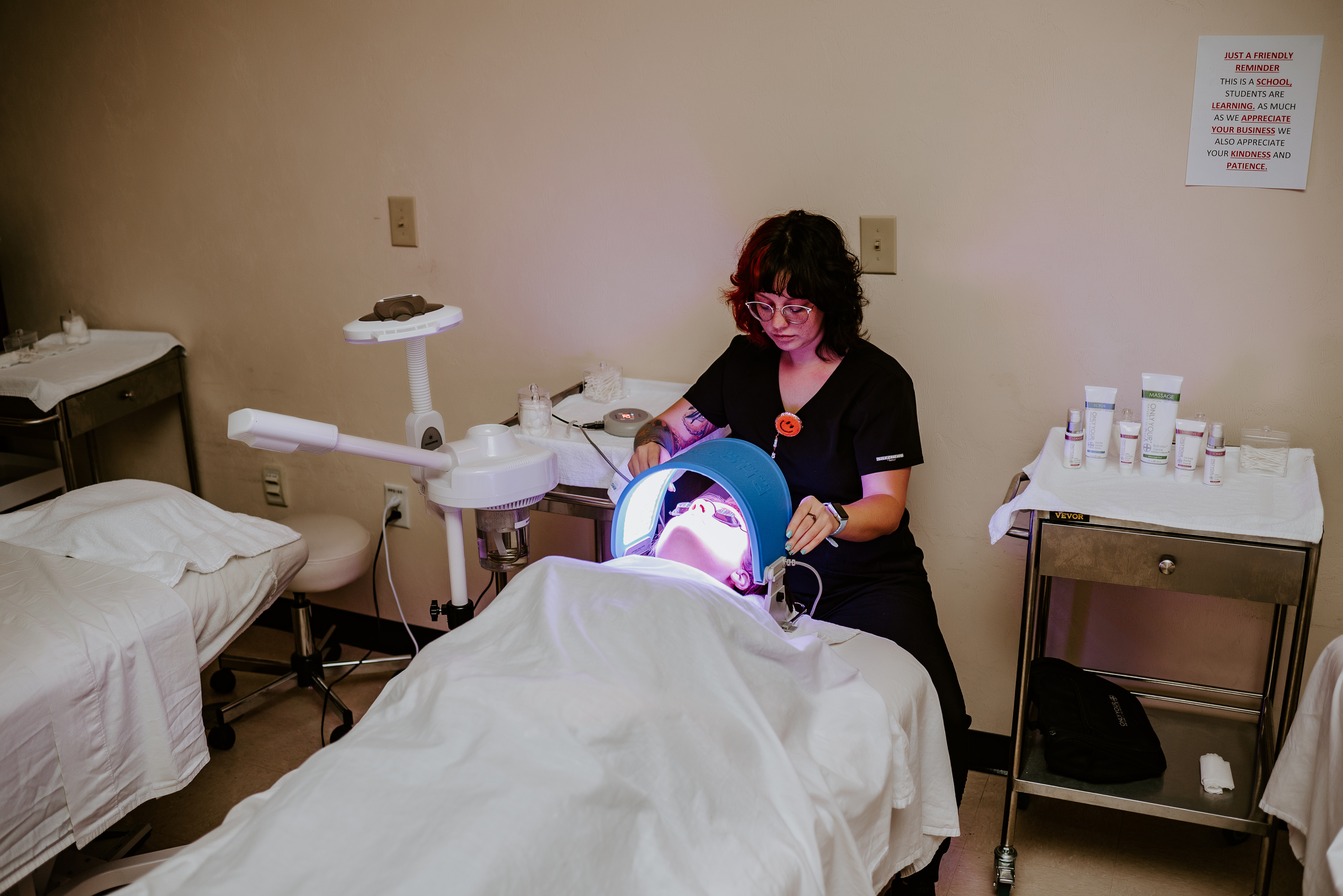 Student performing a facial