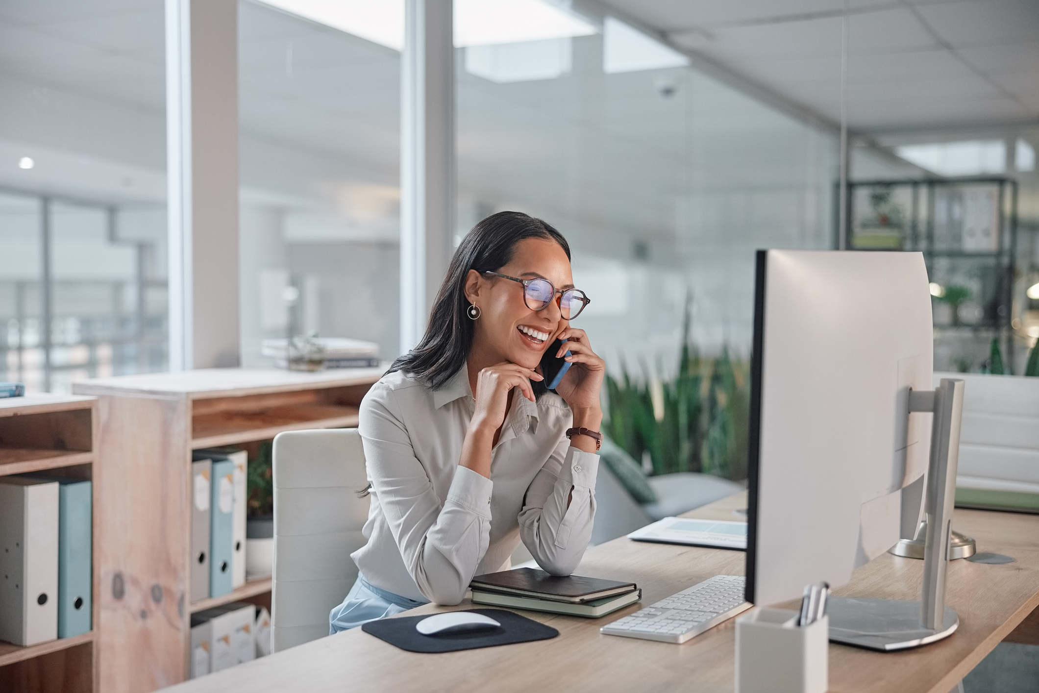 Employee at a desk on the phone