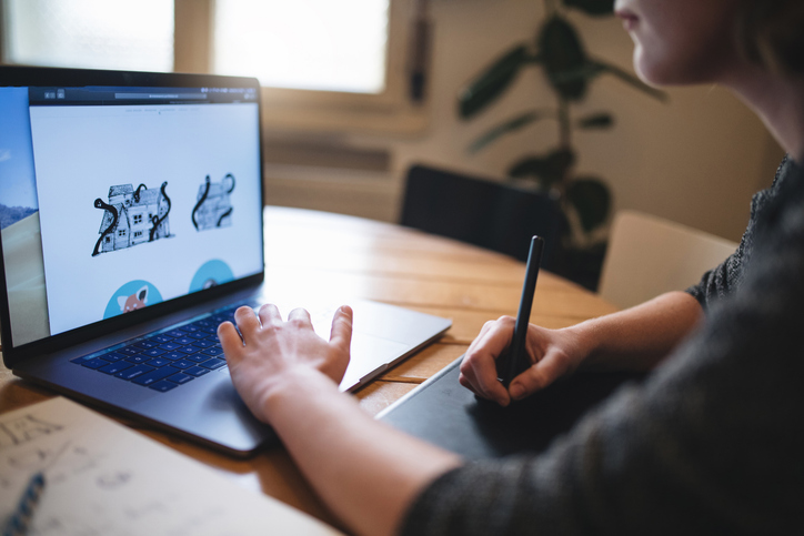 Digital media student on laptop