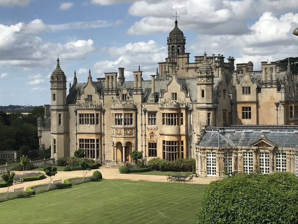 Exterior view of large stone manor house, Harlaxton College
