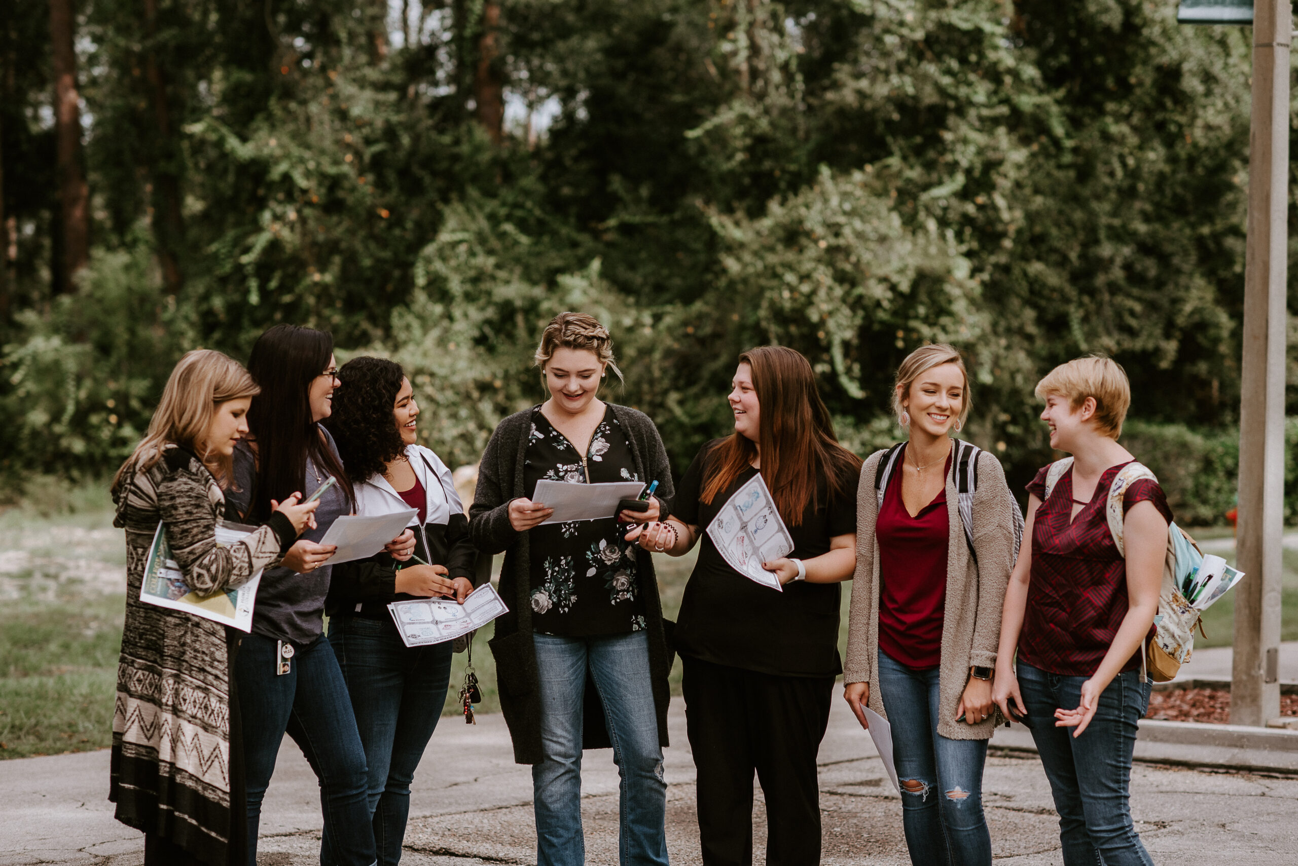 A group of six students standing outdoors.