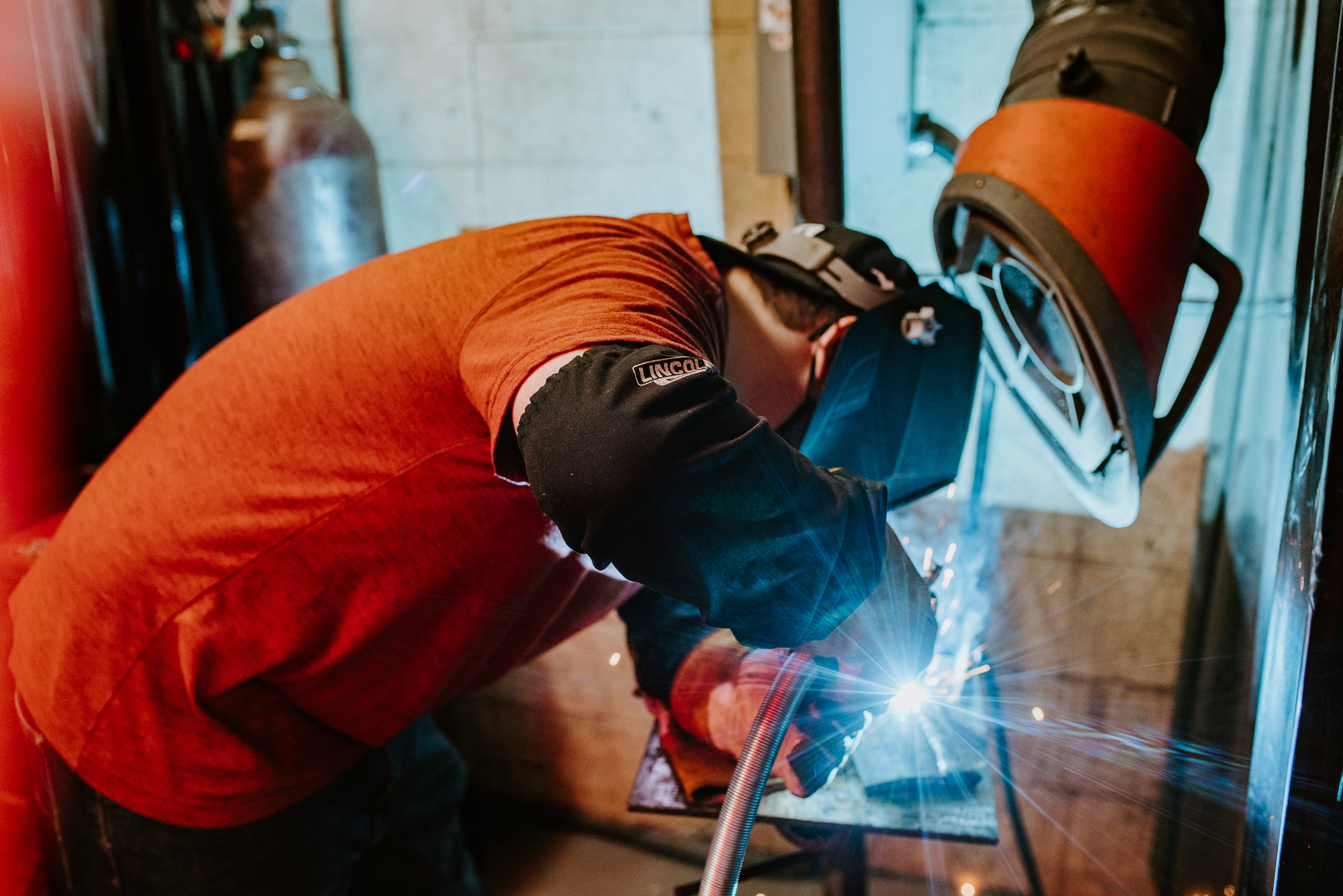 Student performing weld