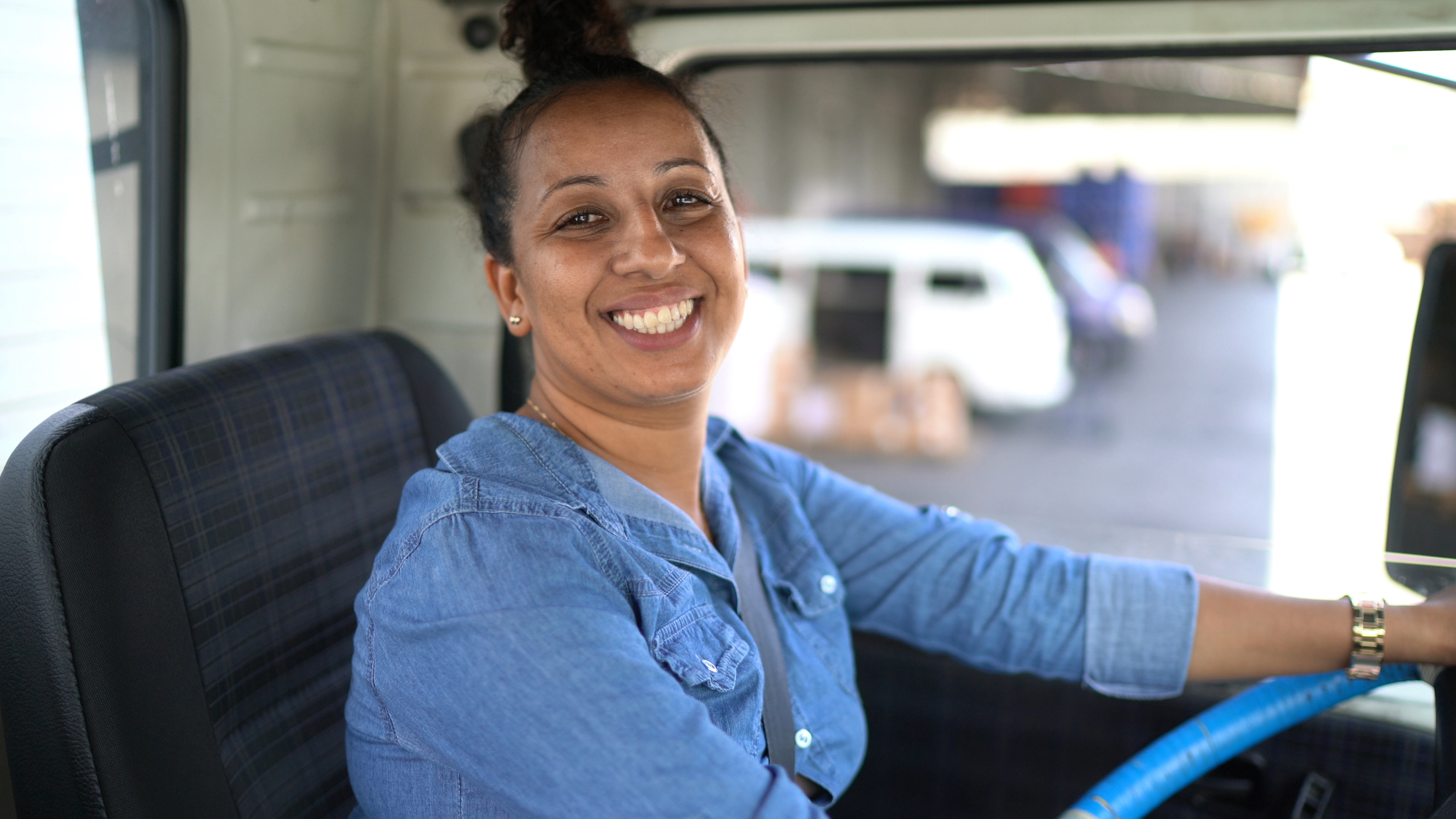 Portrait of a female truck driver smiling